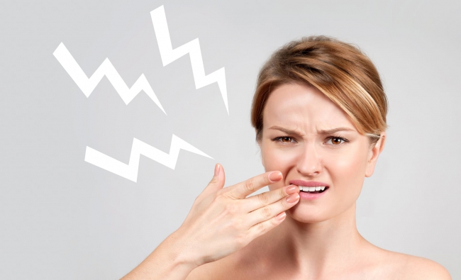 Гиперчувствительность зубов: причины и лечение
